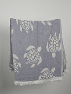 Serviette de plage mousseline