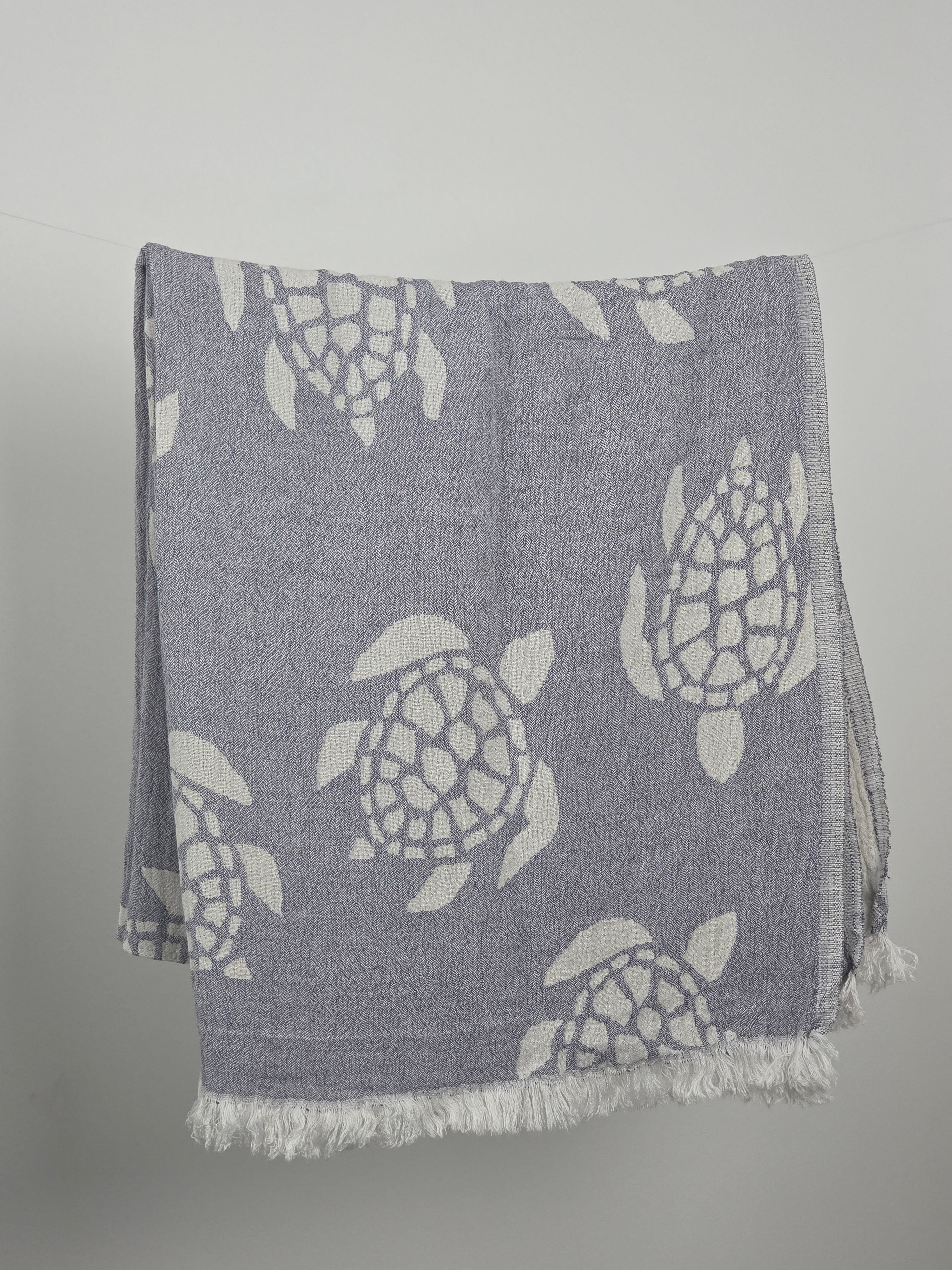 Serviette de plage mousseline