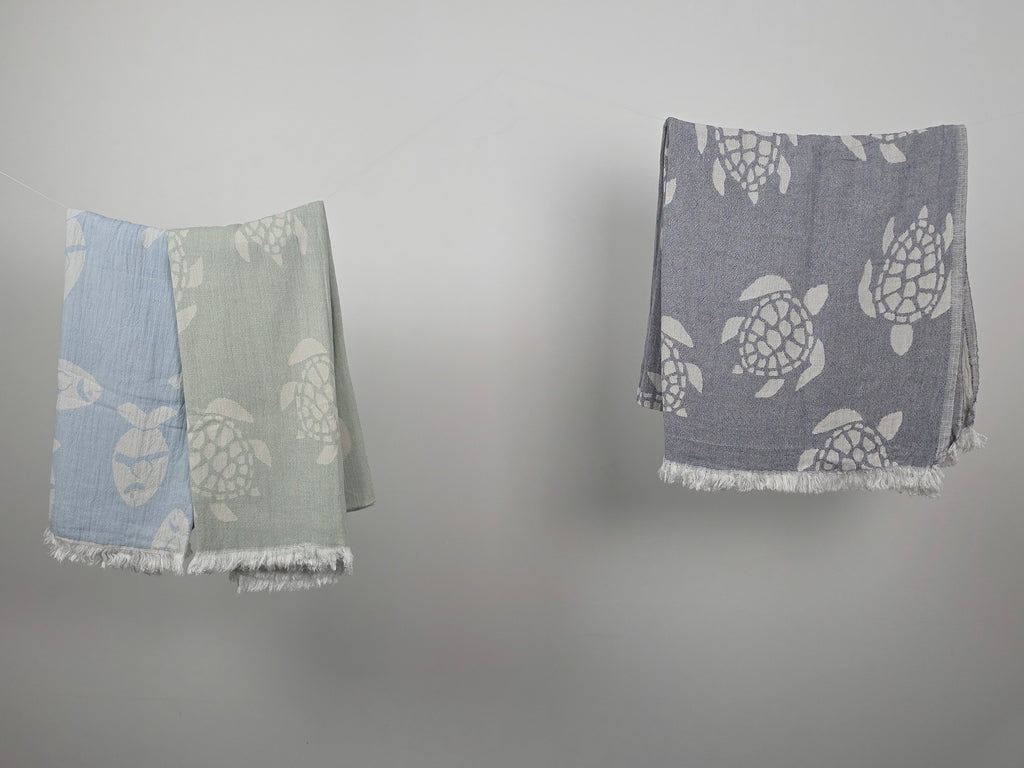 Serviette de plage mousseline